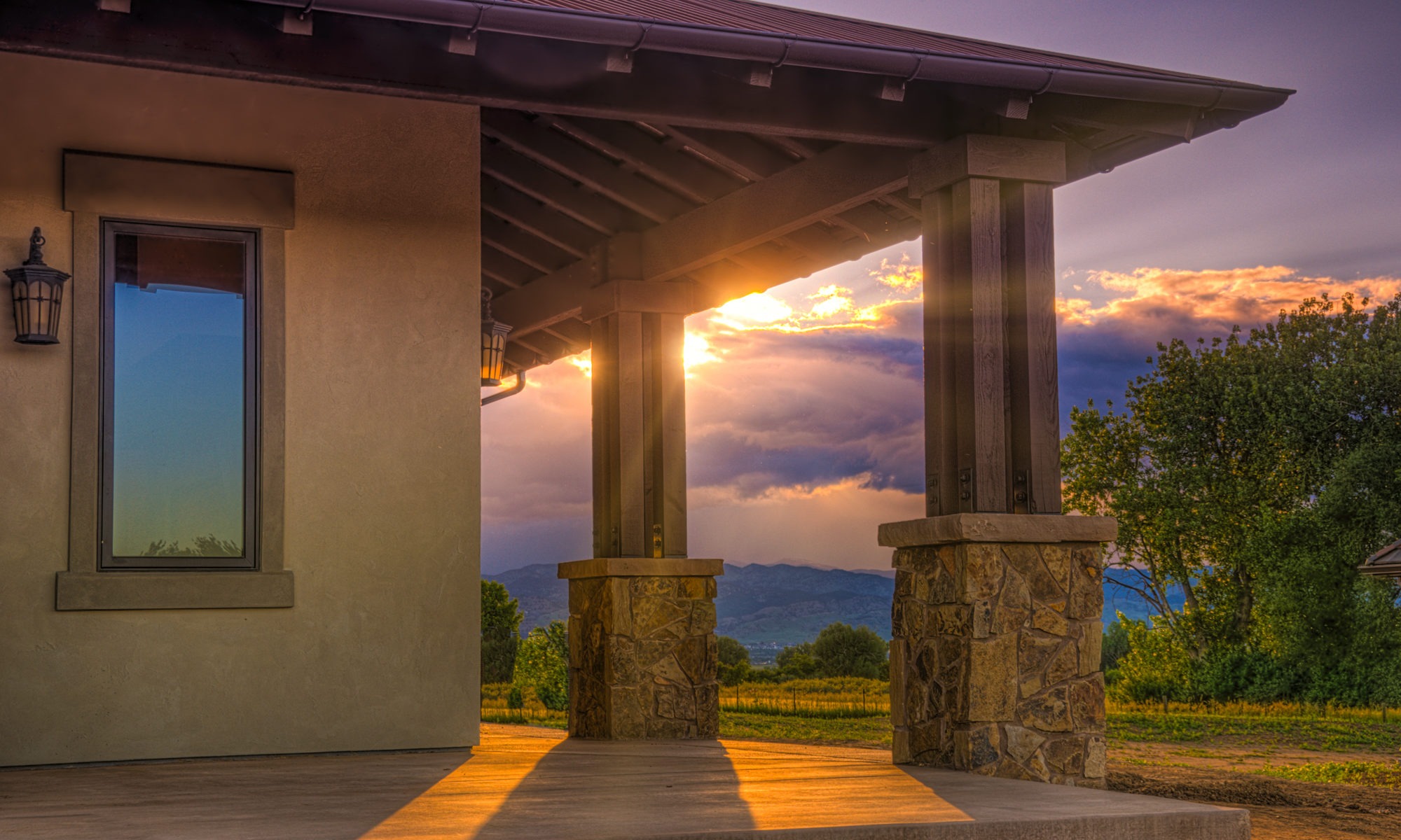 Properties Buy Design - Sunset looking through a porch.